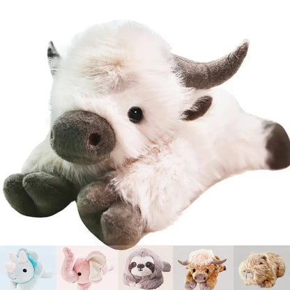 Plush toy of a white creature with dark horns on a white background